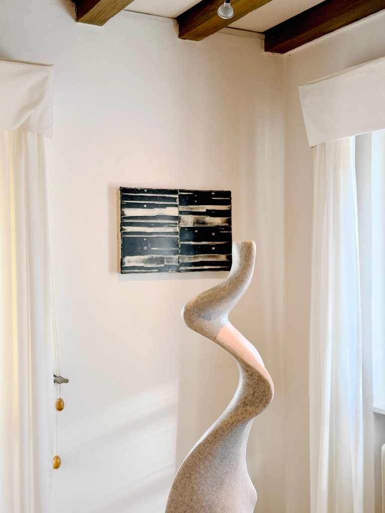 Escultura y cuadro